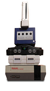 Stack of video-game consoles, of which the Wii is the smallest