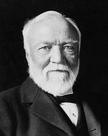 Andrew Carnegie, three-quarter length portrait, seated, facing slightly left, 1913-crop.jpg