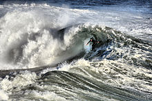 Photo of wave breaking in turbulent waters